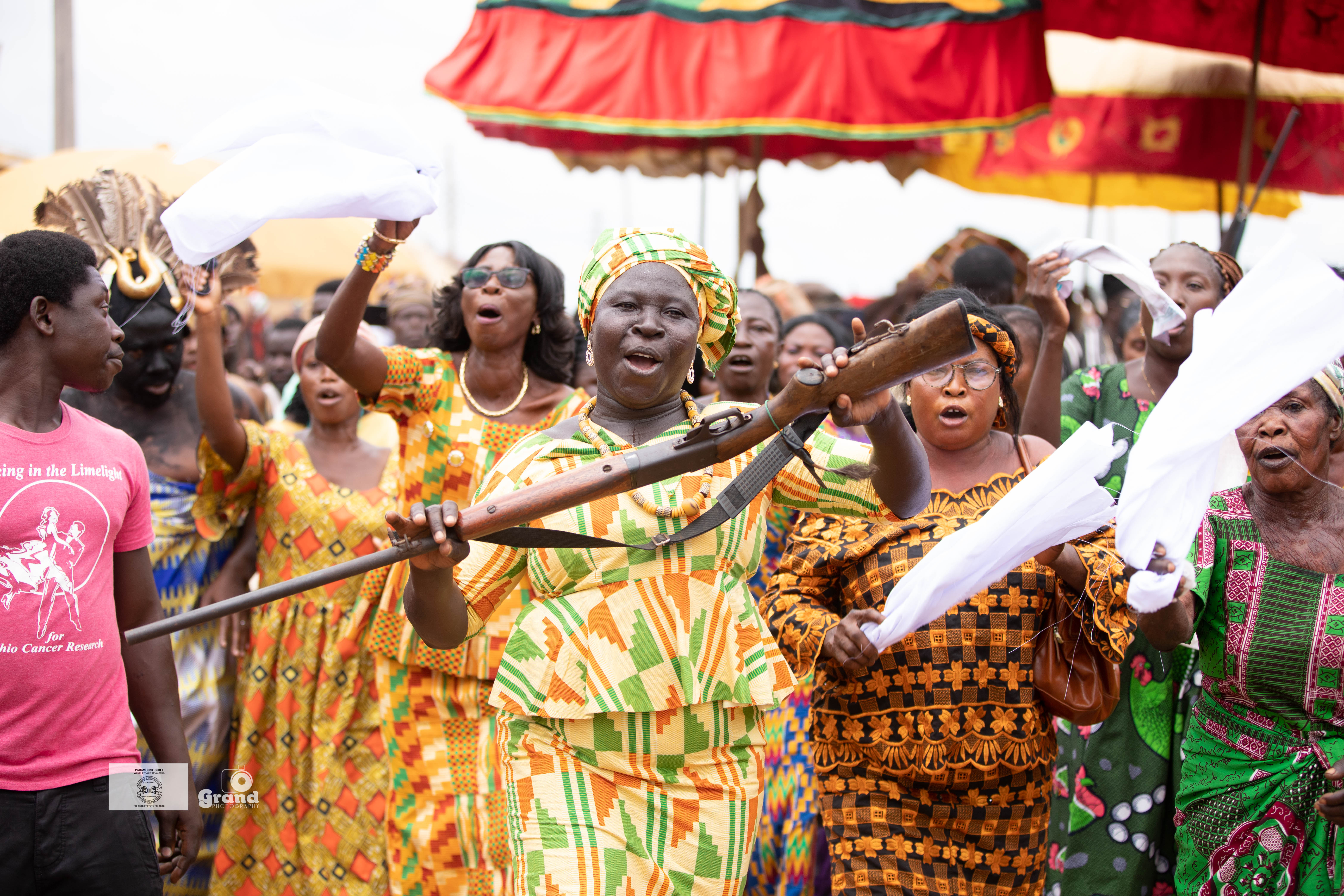 Community elders lead a procession